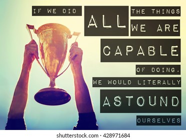 a man holding up a gold trophy cup toned with a retro vintage filter app or action effect with the text: if we did all the things we are capable of doing we would literally astound ourselves