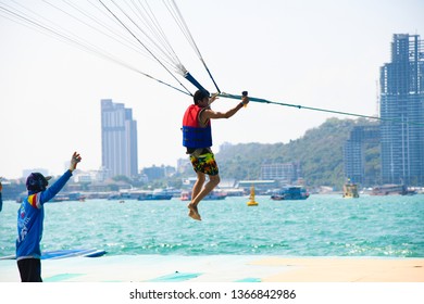 Man Holding Gopro Camera In Hand On Parachute Ride With Gopro Camera In Hand In Air Flight Background Blue Sky Travel Summer, Para Sailing In Pattaya City Thailand ,9th February 2019