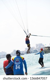 Man Holding Gopro Camera In Hand On Parachute Ride With Gopro Camera In Hand In Air Flight Background Blue Sky Travel Summer, Para Sailing In Pattaya City Thailand ,9th February 2019