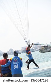 Man Holding Gopro Camera In Hand On Parachute Ride With Gopro Camera In Hand In Air Flight Background Blue Sky Travel Summer, Para Sailing In Pattaya City Thailand ,9th February 2019