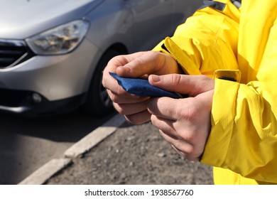 Man Holding Hand Warmer On Street, Closeup