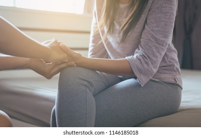 Man holding hands for counsel and support to depressed woman,Psychiatrist holding hands patient,such as making a fresh start and loving yourself,Mental health care concept