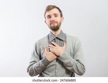 Man Holding His Hand On His Chest 