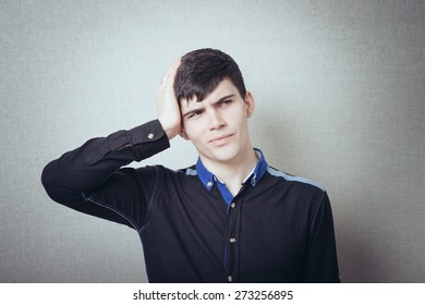 man holding his head, headache - Shutterstock ID 273256895