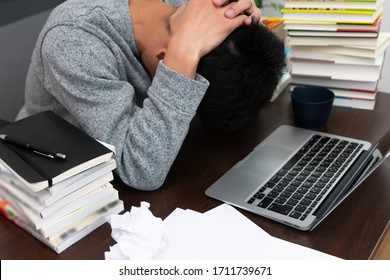 
Man Holding His Head Stuck At Work