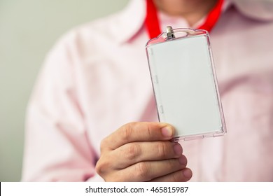 Man holding Identification white blank plastic id card. - Shutterstock ID 465815987