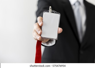 Man Holding Identification White Blank Plastic Id Card.