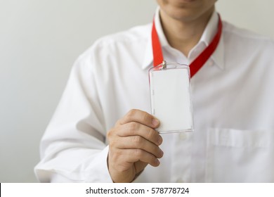 Man Holding Identification White Blank Plastic Id Card.