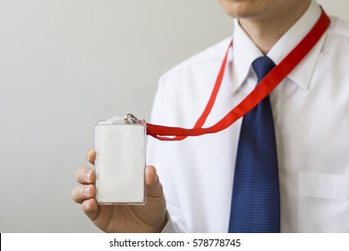 Man Holding Identification White Blank Plastic Id Card.