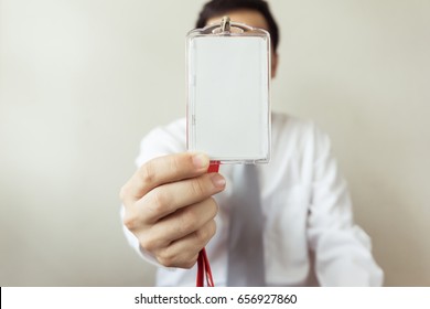 Man Holding Identification White Blank Plastic Id Card.