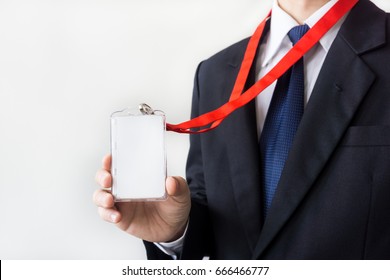 Man Holding Identification White Blank Plastic Id Card.