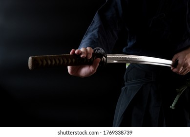 The man holding japanese sword