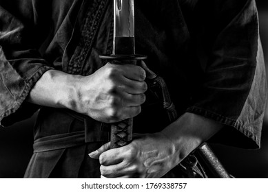 The man holding japanese sword