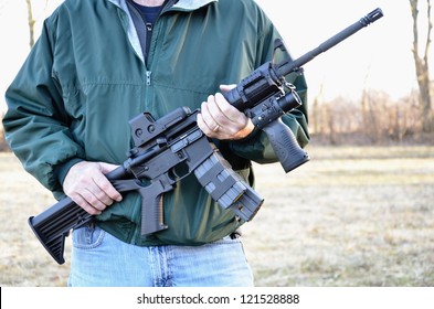 Man Holding M4 Rifle