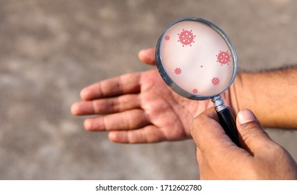 Man Holding Magnifying Glass And Check Hand. Hand Watch And Germs On Hands Concept.