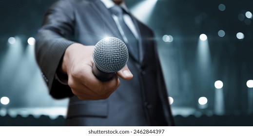 Man holding microphone on various backgrounds. - Powered by Shutterstock