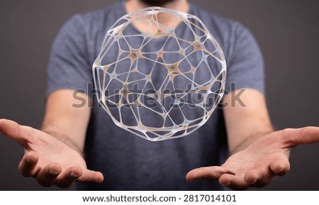 Man holding a network sphere concept representing connectivity