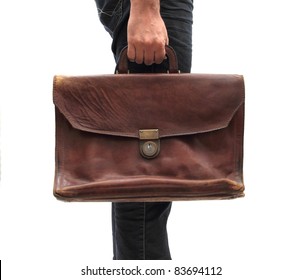 Man Holding An Old Leather Bag