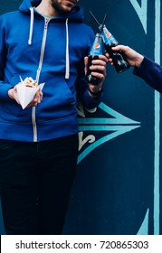 Man Holding Pepsi And Hot-dog