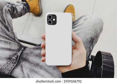 Man Holding A Phone Case Mockup.