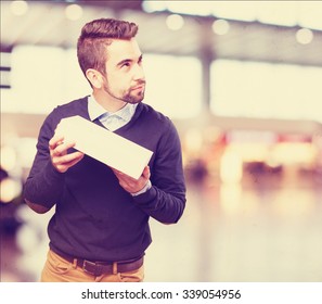 Man Holding A Product