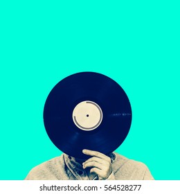 Man Holding Record, Isolated On Green. Art Filter, Music Background