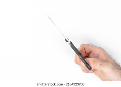 Man Holding Scissors On White Background