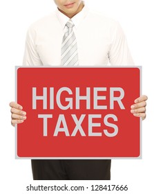 A Man Holding Sign Indicating Higher Taxes