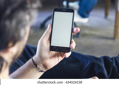 Man Holding Smart phone - Mobile Phone Mock Up
