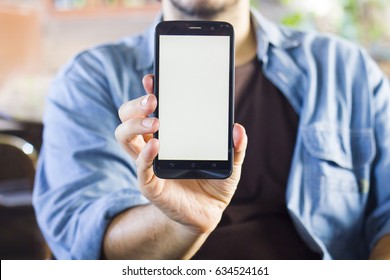 Man Holding Smart Phone - Mobile Phone Mock Up