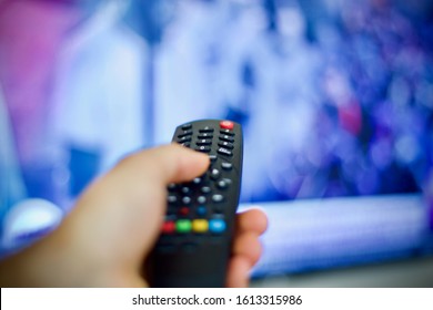 Man Holding Smart Tv Remote Control