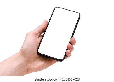 Man holding smartphone with blank screen on white background, closeup of hand. Space for text - Shutterstock ID 1738567028