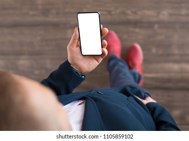 Man Holding Smartphone. Mobile Phone Screen Mockup.