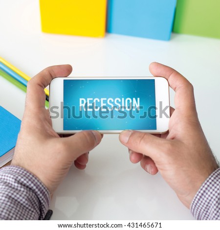 Man holding smartphone which displaying Recession