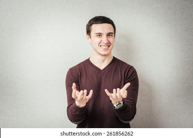 168 Man With Arms Up Holding An Imaginary Object Images, Stock Photos