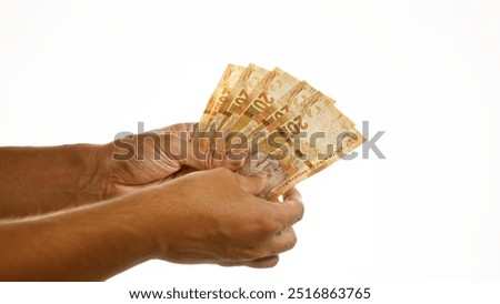 Similar – Woman hands with group of fifty euros banknotes