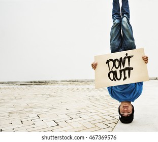 Man Holding Speech Sign Don't Quit Concept