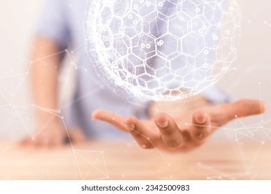 A man holding a sphere with interconnected polygons. concept of a global digital telecommunications