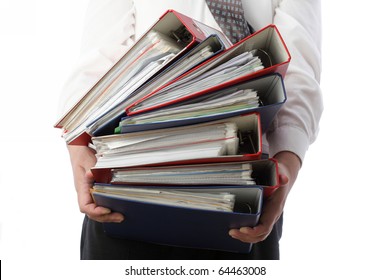 Man Holding Stack Of Folders Pile With Old Documents And Bills. Isolated On White Background