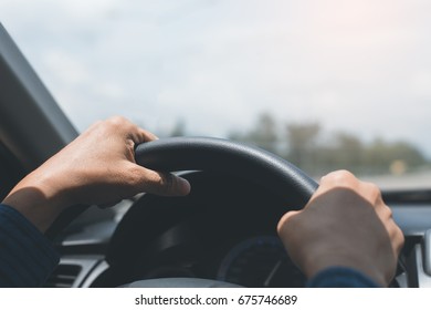 Man Holding Steering Wheel, Driving A Car In Sunny Day, Close Up