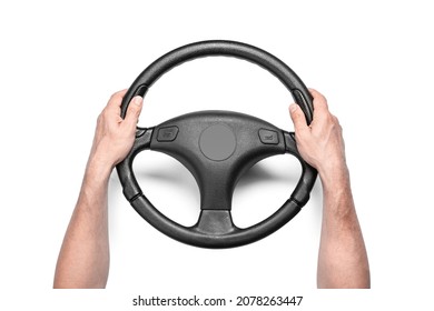 Man holding steering wheel on white background