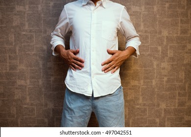 Man Holding Stomach