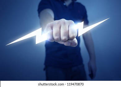 A Man Holding A Stylized Electric Bolt.