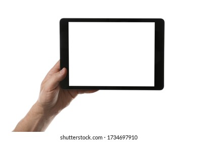 Man holding tablet computer with blank screen on white background, closeup. Modern gadget