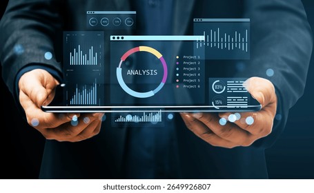 Man holding tablet with digital financial analysis dashboard, bar charts, and circular KPIs on dark background, concept of business analytics
