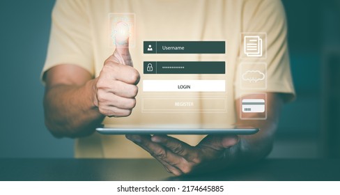 Man holding the tablet in hand and scanning fingerprint to access internet, cybersecurity concept on the internet, internet and networking concept. 