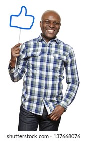 Man Holding A Thumbs Up Sign Smiling On White Background