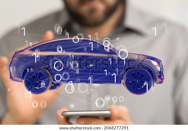 Man holding\
and touching holographic smart car\

