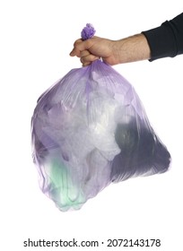 Man Holding Trash Bag Filled With Garbage On White Background, Closeup