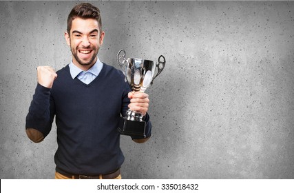 Man Holding A Trophy